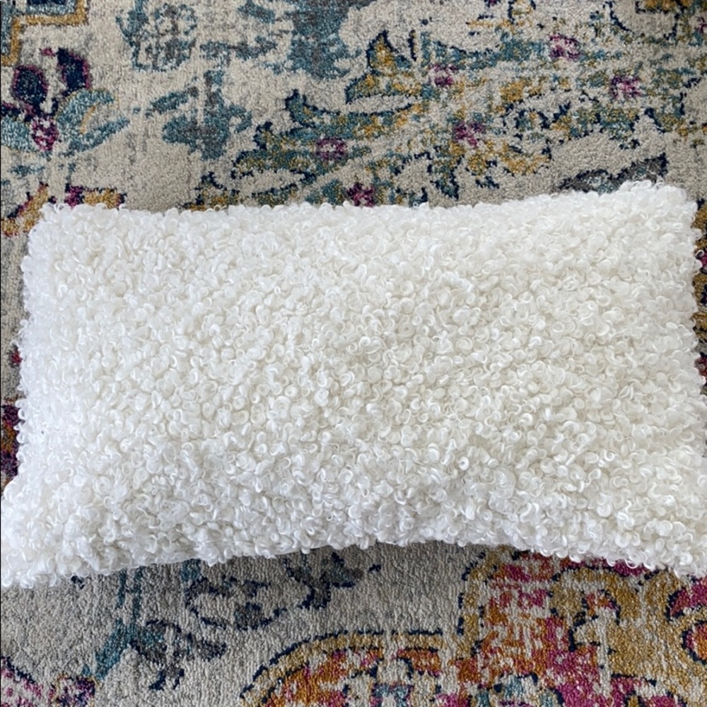 White fluffy lumbar pillow